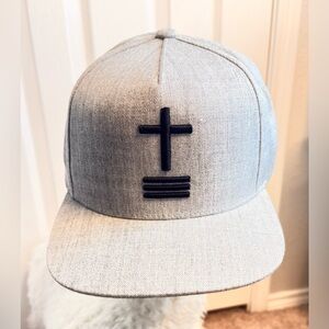Gray Snapback Hat with Black Cross Accent